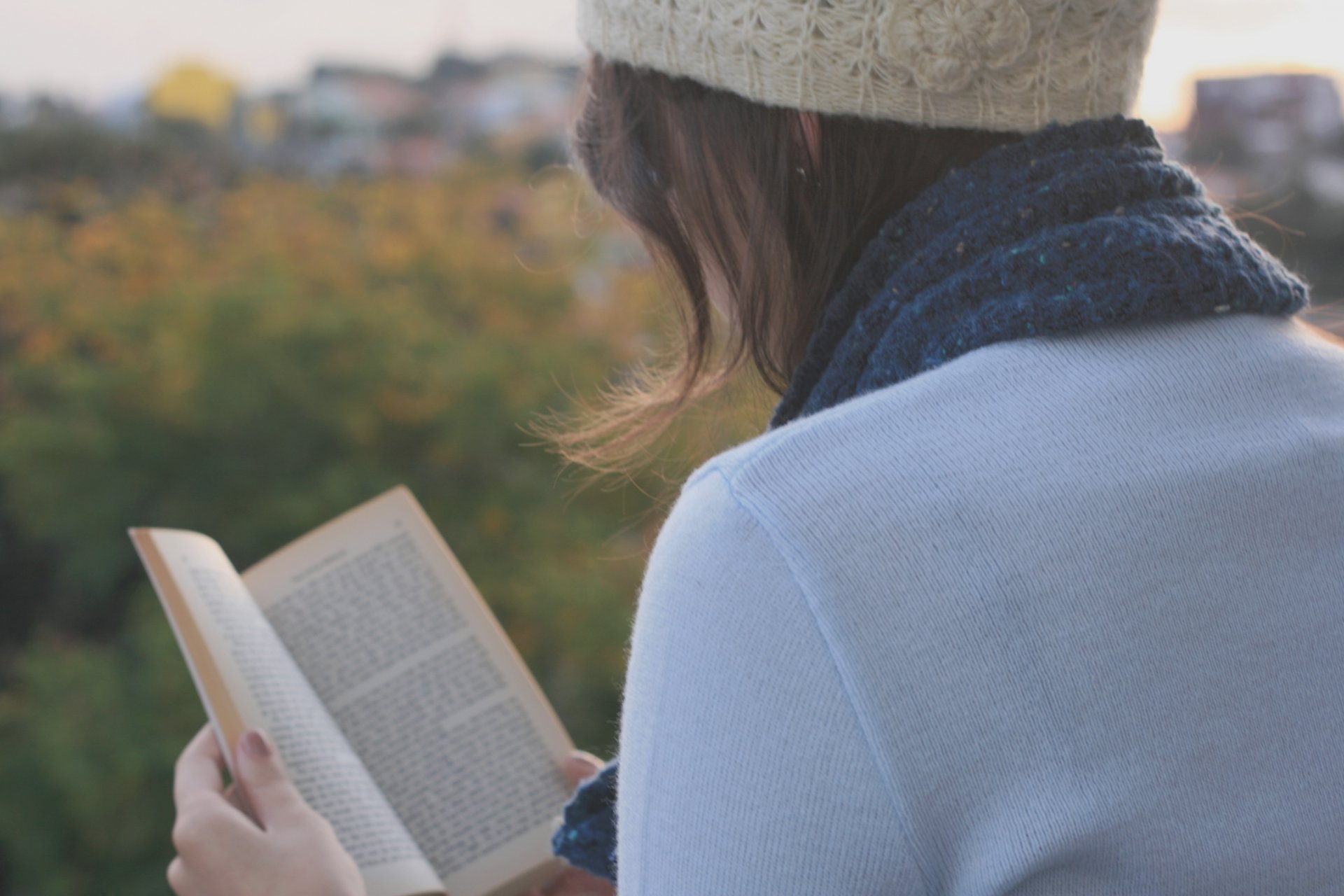 moods girl brunette dark-haired hat scarf sweater book book reads inscriptions text nature trees foliage leaves autumn background widescreen wallpaper fullscreen desktop wallpaper desktop wallpaper wallpaper