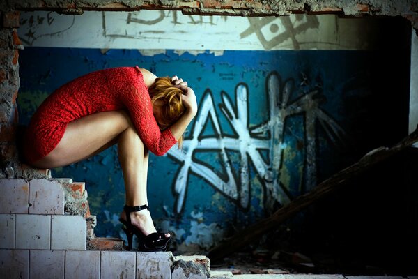 The girl in red on the stairs