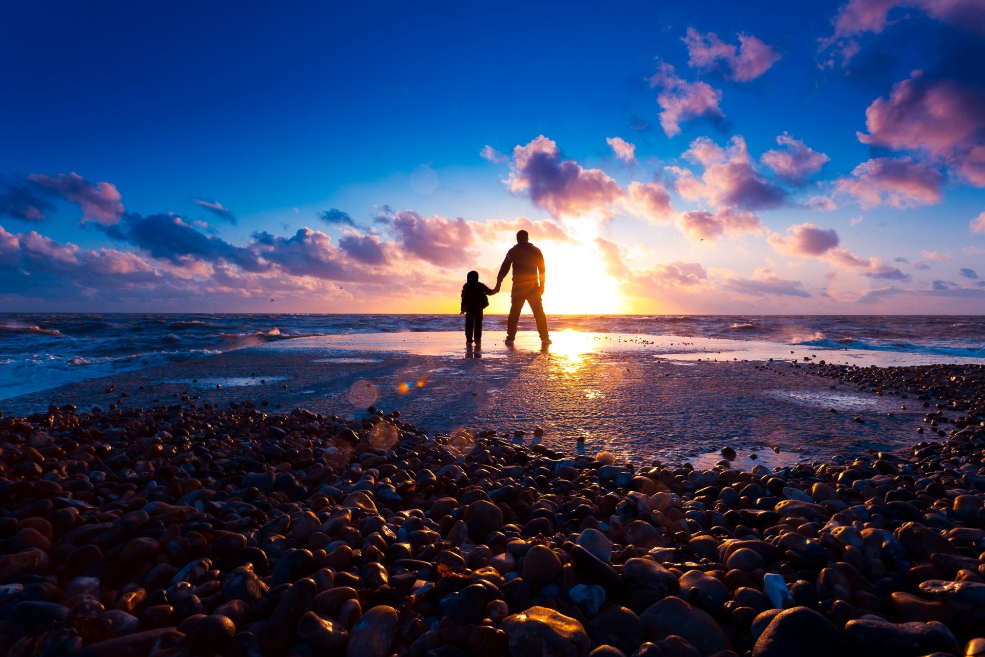 hore sea rocks beach sunset sun rays light guy boy silhouette mood