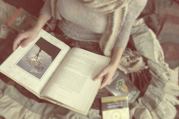 A girl is reading a book. Aesthetics
