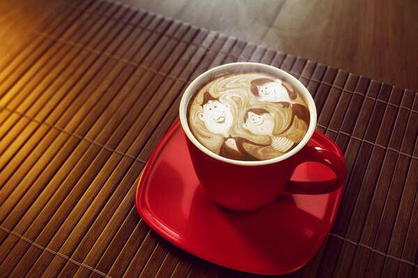 Cappuccino with a pattern in a red cup