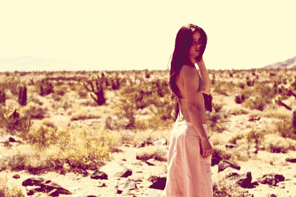 Exotic desert girl without mood