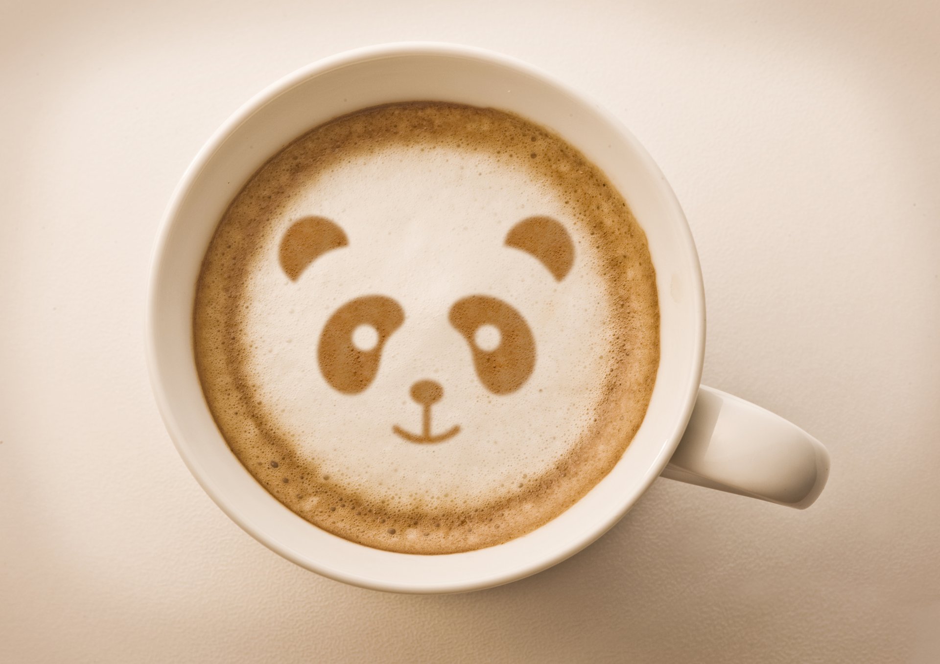 hintergrund tasse kaffee schaum muster panda