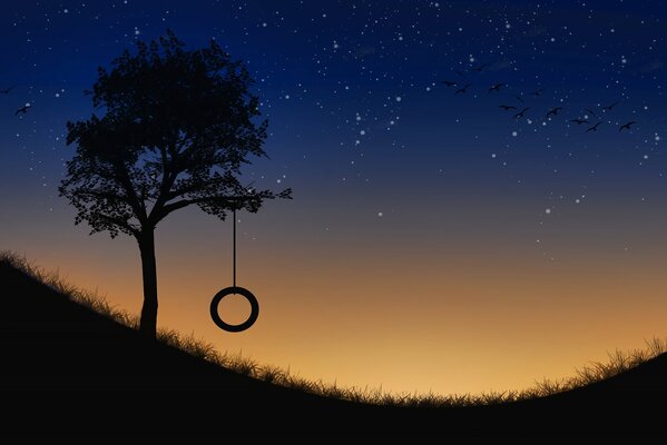 A wheel on a tree under the stars