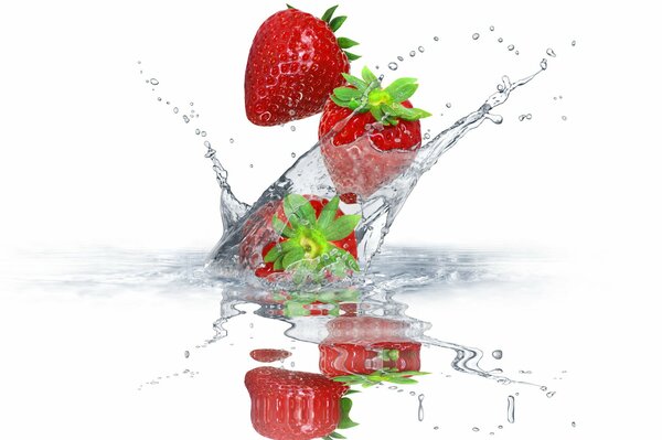 Fresas maduras en spray de agua