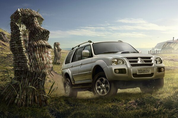 Mitsubishi pajero imagen con un tronco