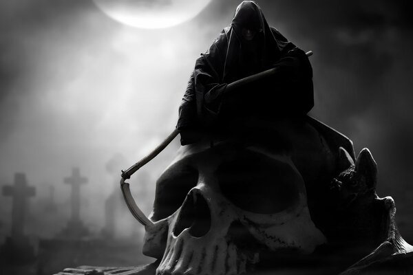 La silhouette de la mort sur le crâne avec les tombes en arrière-plan