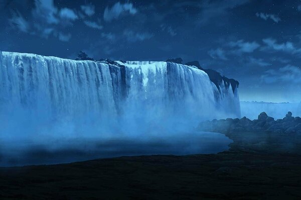 Amplia cascada contra el cielo nocturno