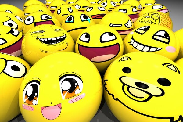 Bolas amarillas con caras en forma de emoticonos