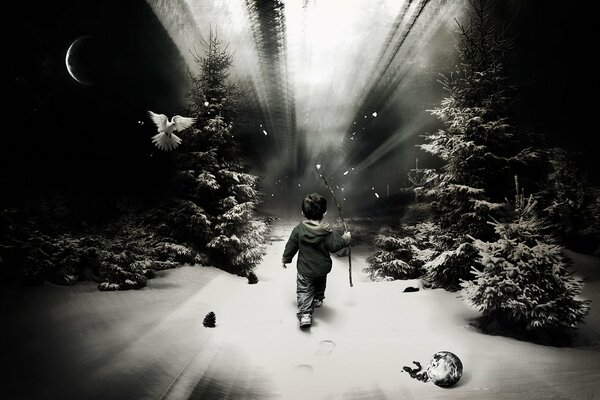 Niño caminando por el bosque nevado