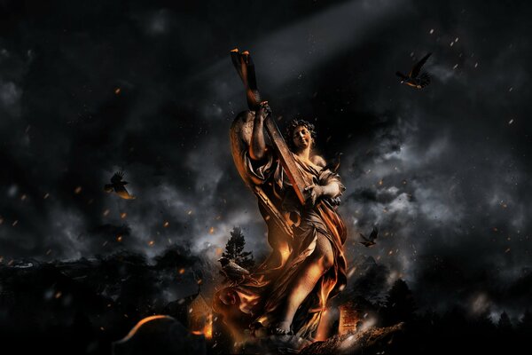 A statue with a cross on fire and birds flying over the ashes