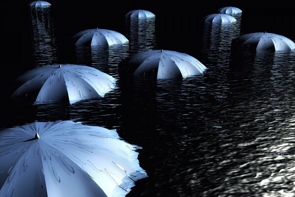 Plain gray umbrellas on black water