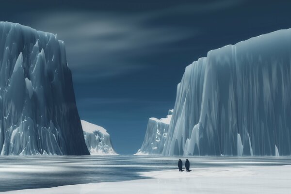 Two penguins among mountains of ice