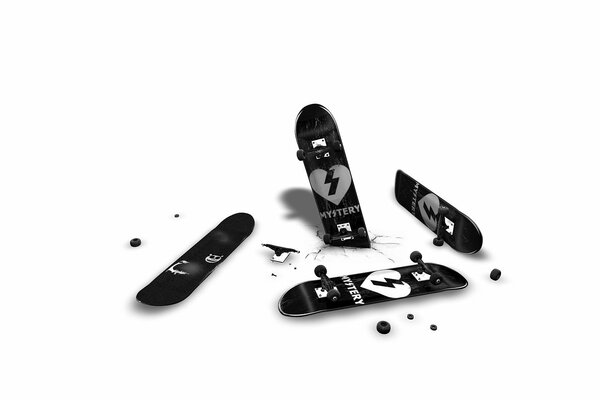 Skate, broken skate and scattered wheels