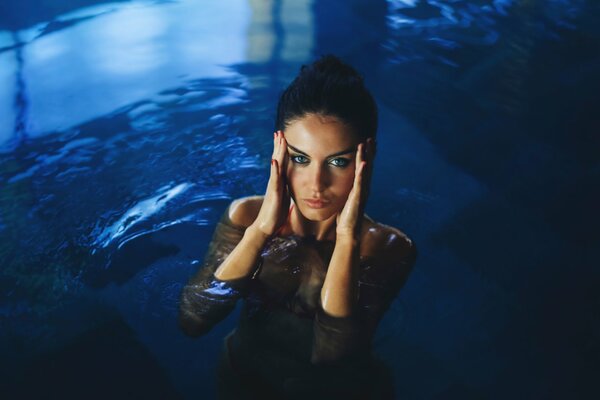 Photo of David olkarni with a girl in the water