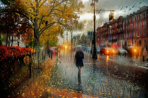 San Pietroburgo. Ottobre. Ragazza sotto l ombrello