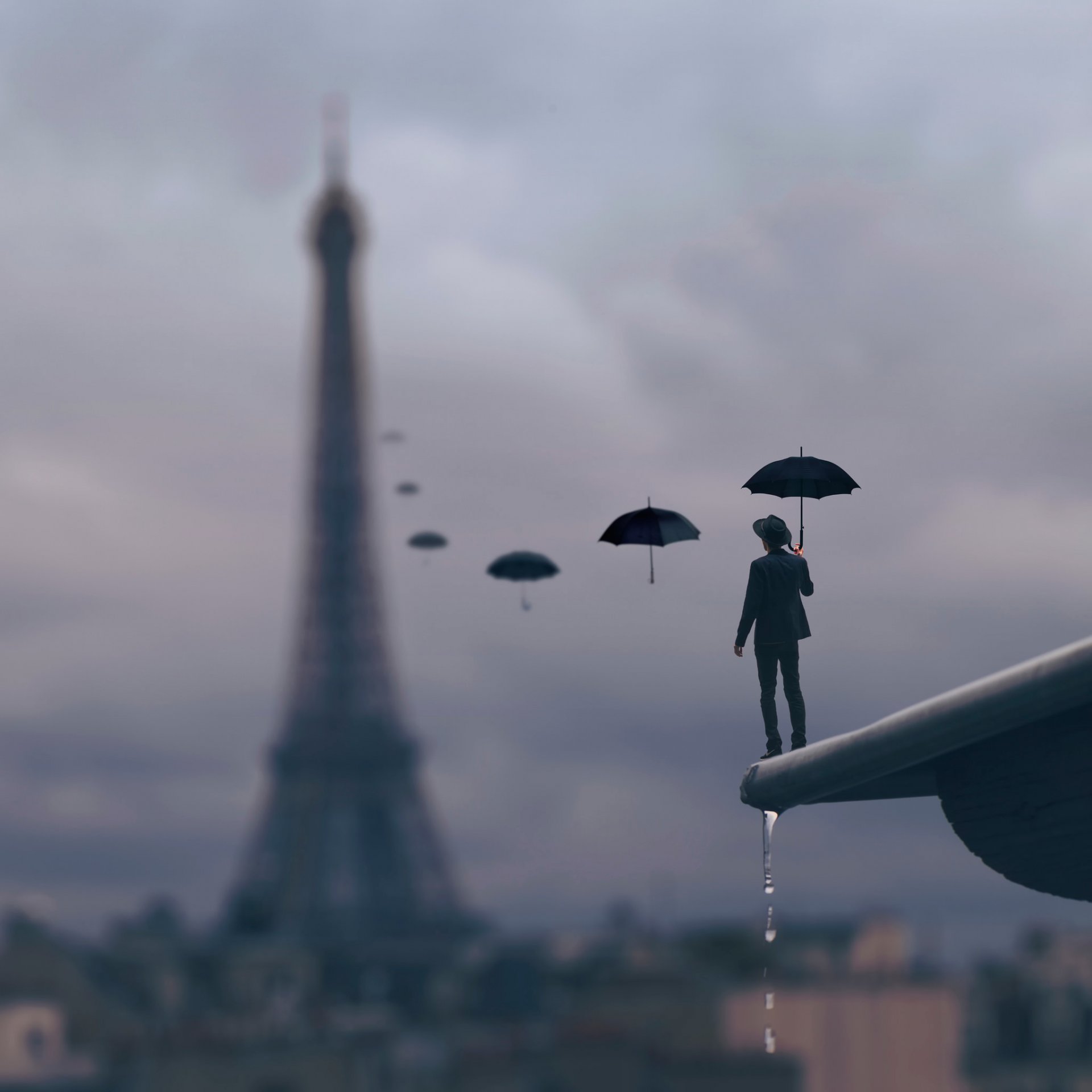 mann dach paris regenschirm tropfen regen