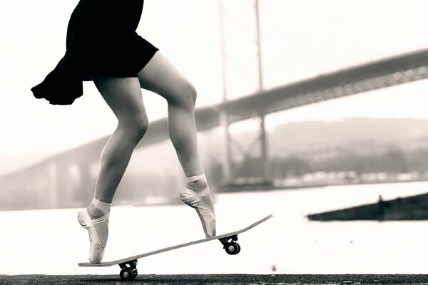 A ballerina on a skateboard rides on the street cool