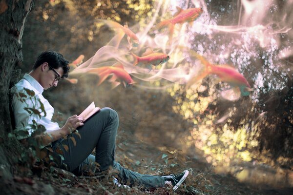 Le jeune homme lisant un livre d imagination