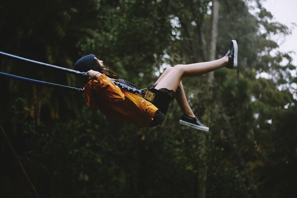 Flying man on a swing