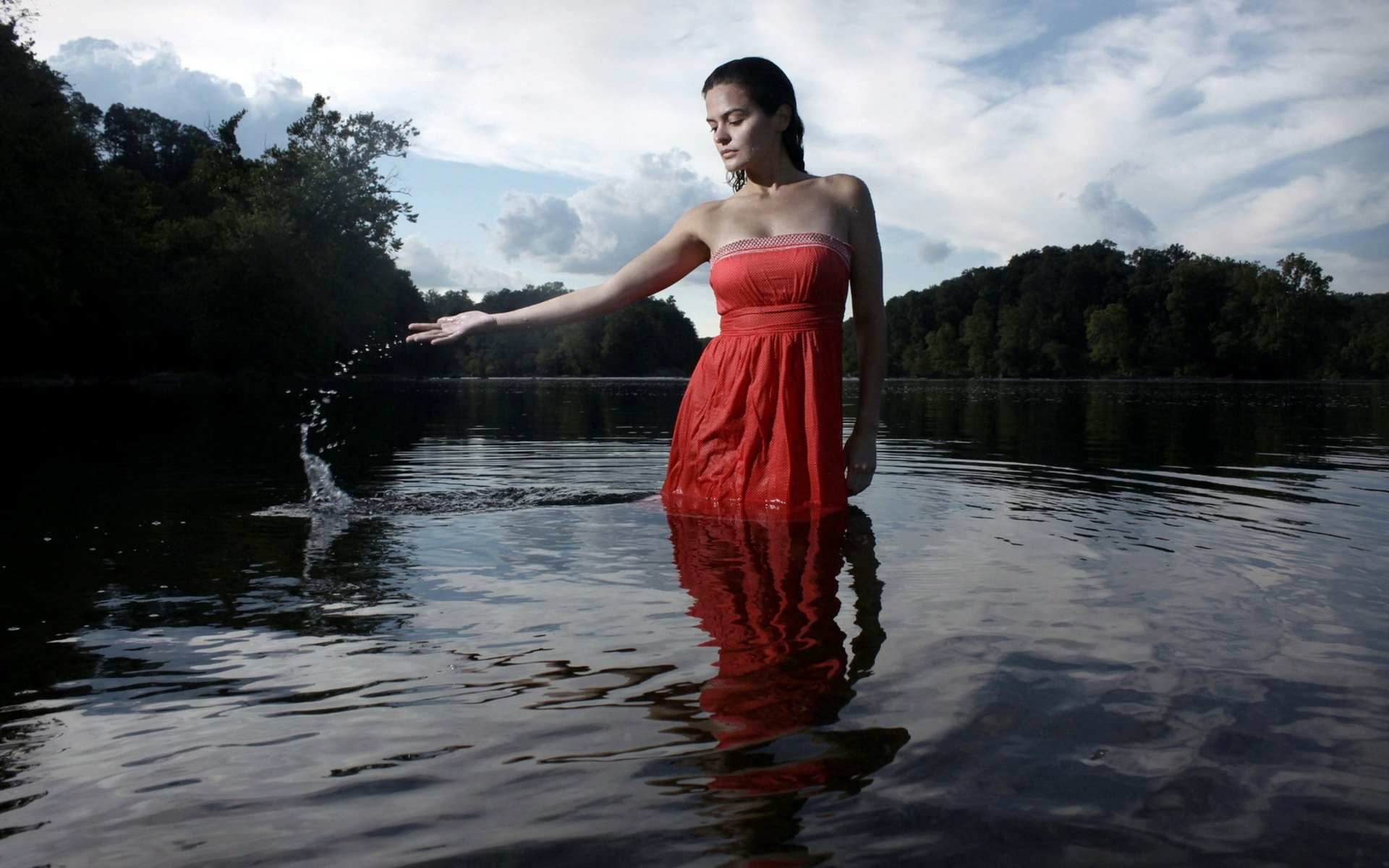 brown hair red sundress water drops spray nature