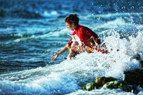 A girl during the surf on the shore