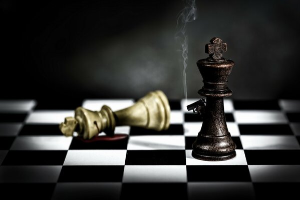 A chess piece shoots another piece