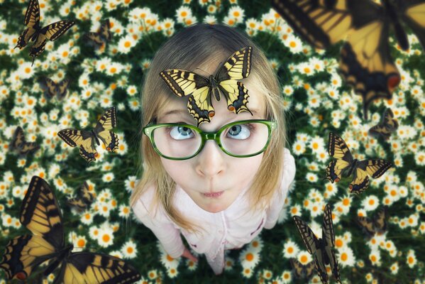 Girl with glasses, field, butterflies