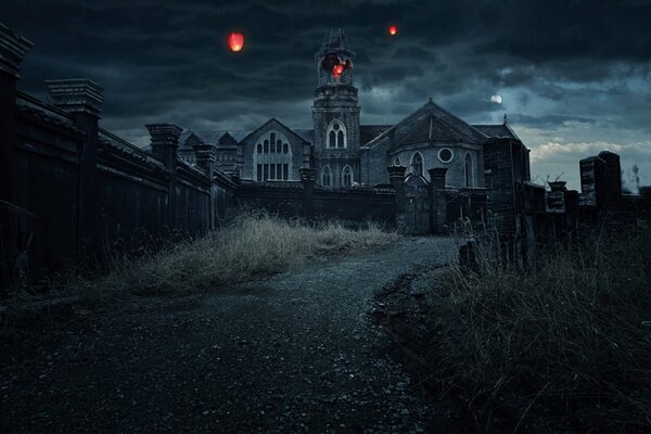 Foto del monasterio nocturno con linternas en el cielo