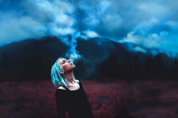 A girl with blue hair exhales the sky