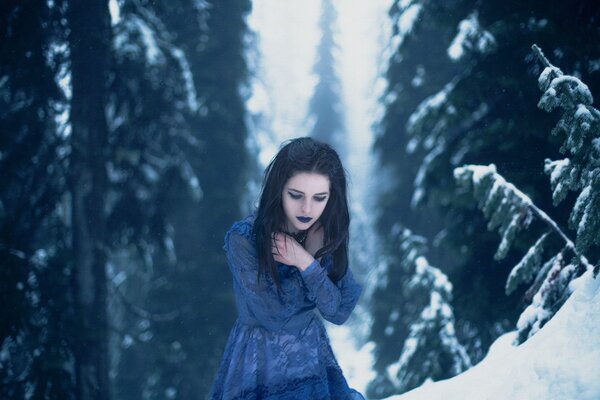 A girl in the winter forest