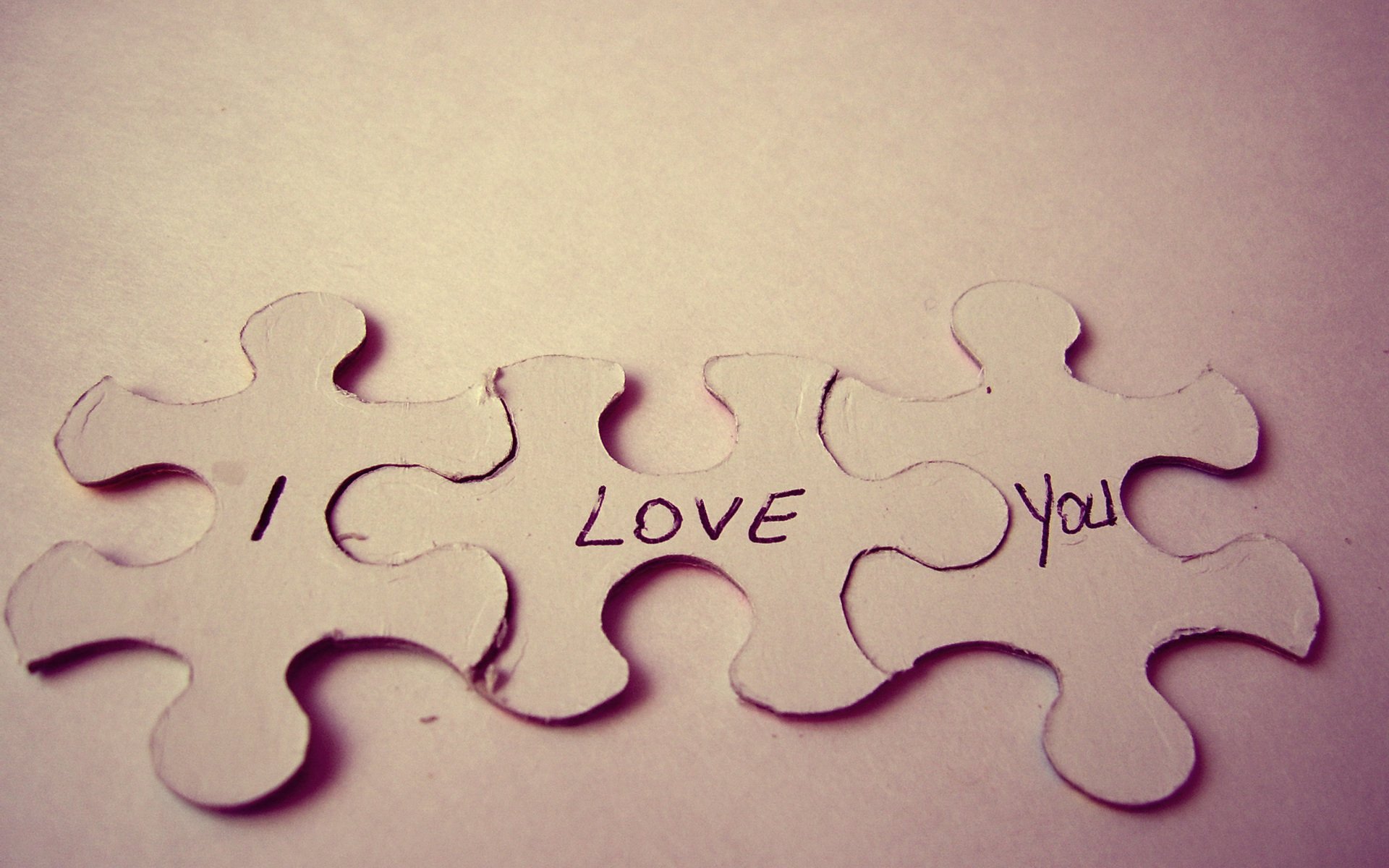 puzzles the text love i love you background close up