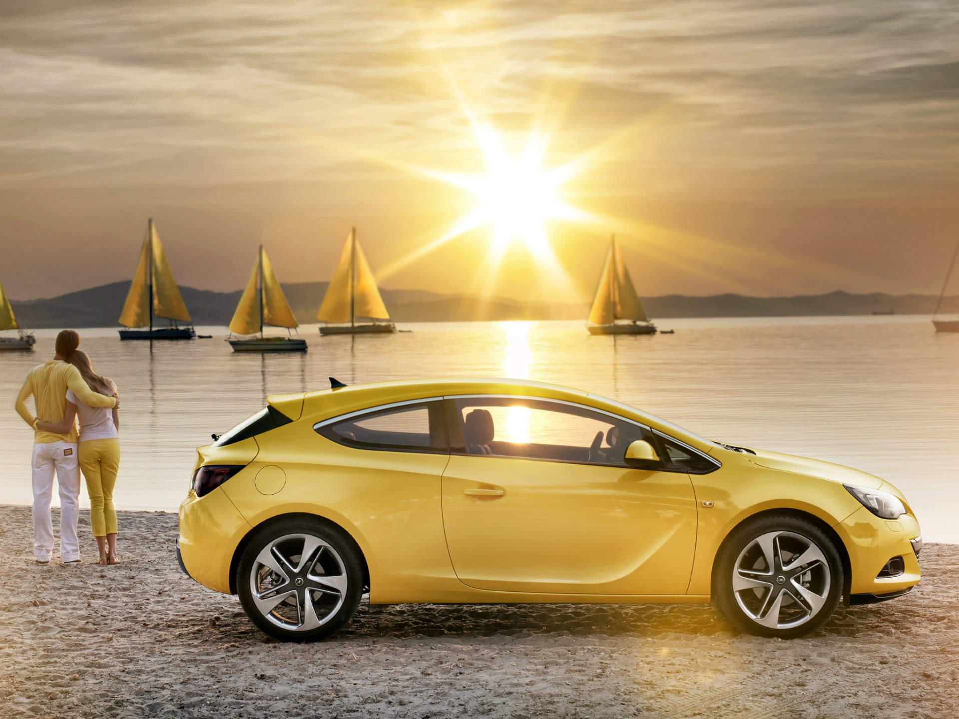 opel astra gtc opel astra coupe yellow girl and guy shore water yachts sails sun sunset romance