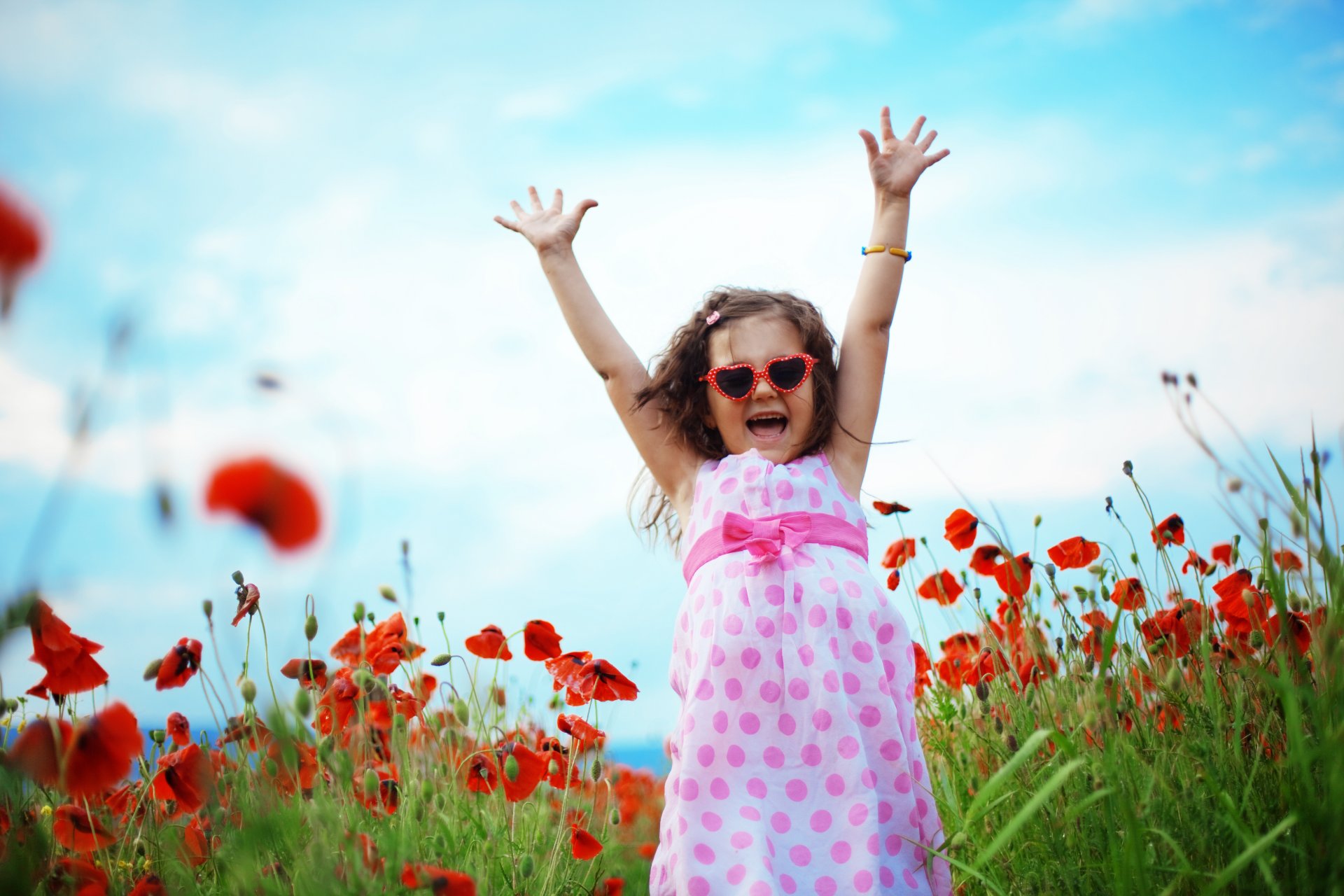 girl children mood happiness laughter the field poppies grass nature summer