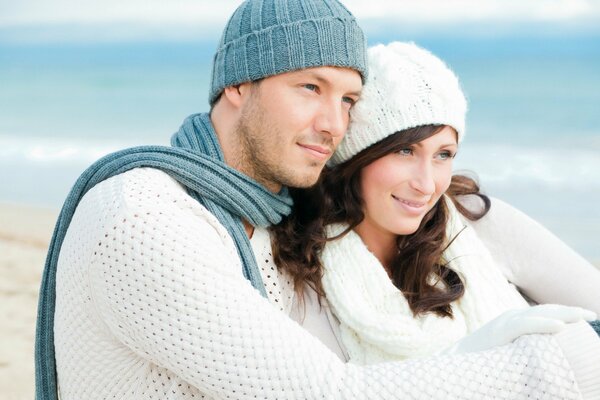 A couple in love in an embrace on the seashore