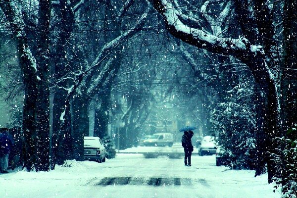 Guy with a girl in winter in the cold