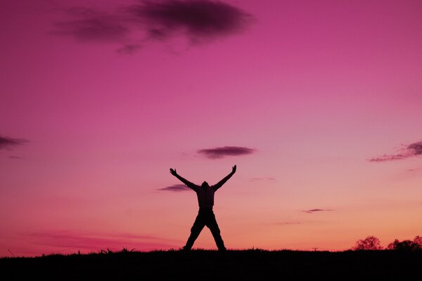 La alegría de la libertad en el fondo del amanecer