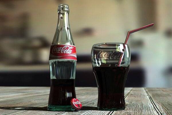 Ein Glas Coca-Cola mit einem Röhrchen