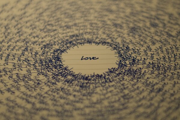 The word love in English written by hand