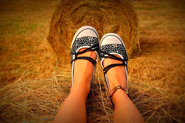 The girl is resting in the hayloft