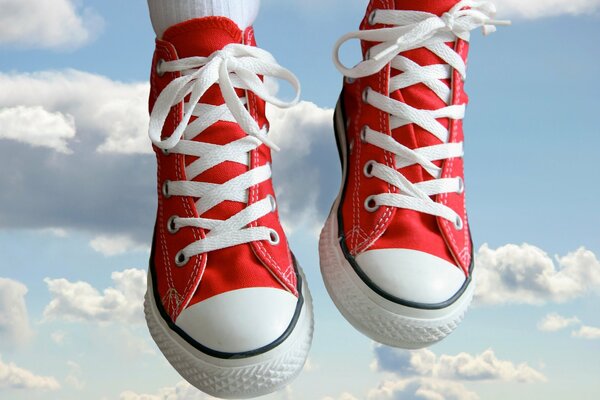 Red sneakers. Sit in the clouds