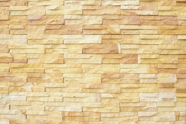 A stone wall. Light tones