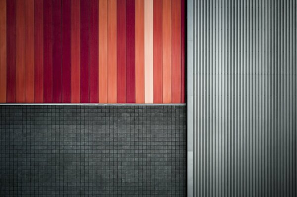 An inverse design solution with a wall in dark and red tones