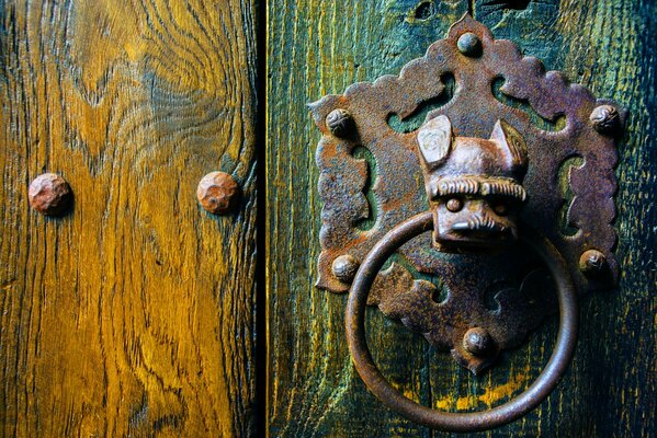 Antique door with metal handle