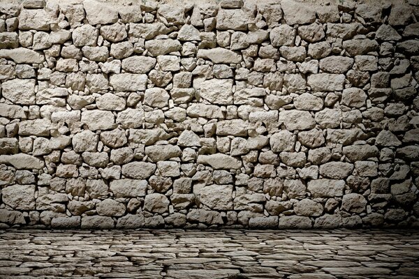 Pared de mampostería de piedra gris