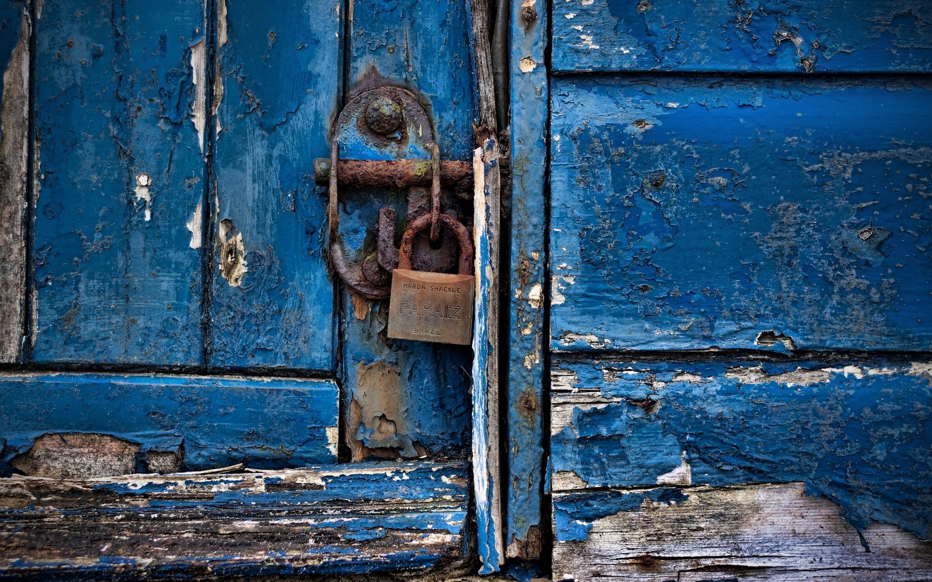 padlock blue paint door wood