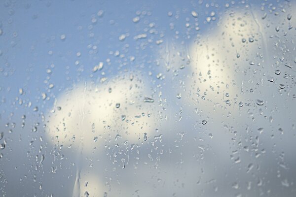 Drops on the glass through which you can see the sky