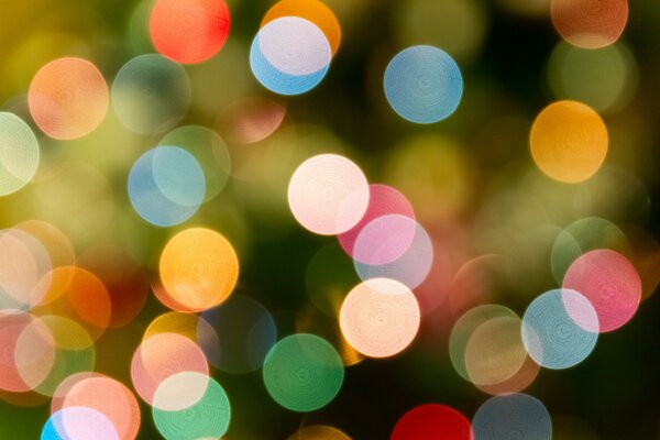 Colorful shiny confetti on the background