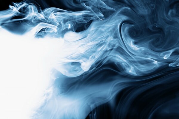 A bluish fog swirling in the darkness