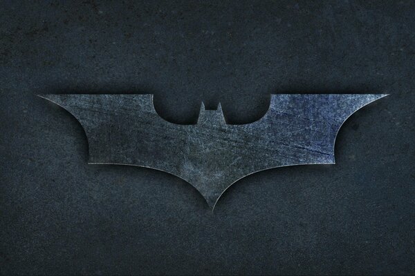 The volume emblem of the Batman silhouette